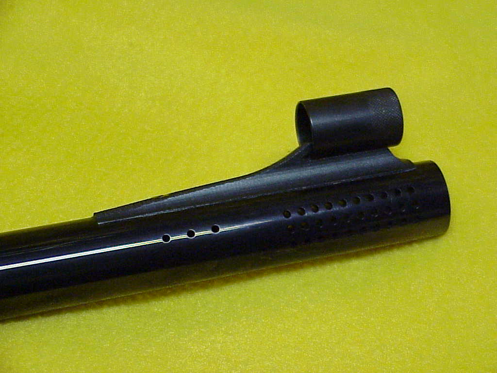 Weatherby .460 Custom with babinga wood and ported barrel, open sights.